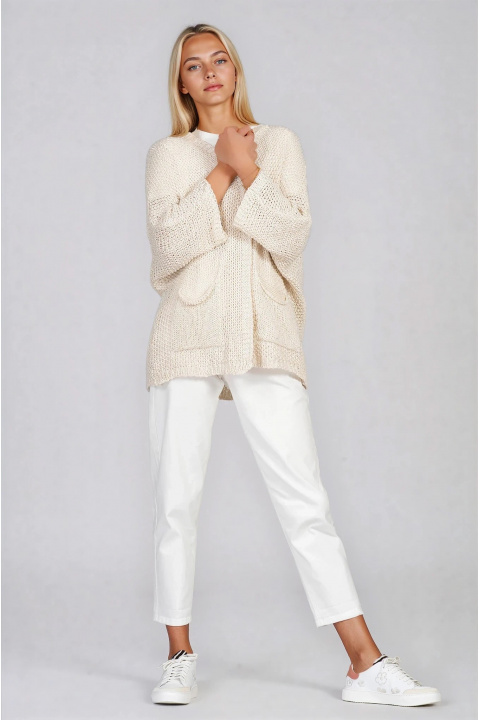 Дамска плетена жилетка в светлобежово с два джоба