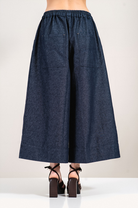 Дамски дънки в тъмносиньо с широк крачол и еластична талия