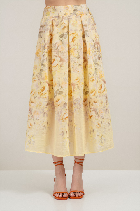 Пола от шифор в жълто с флорален принт