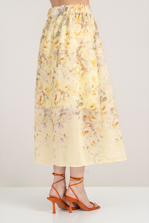 Пола от шифор в жълто с флорален принт