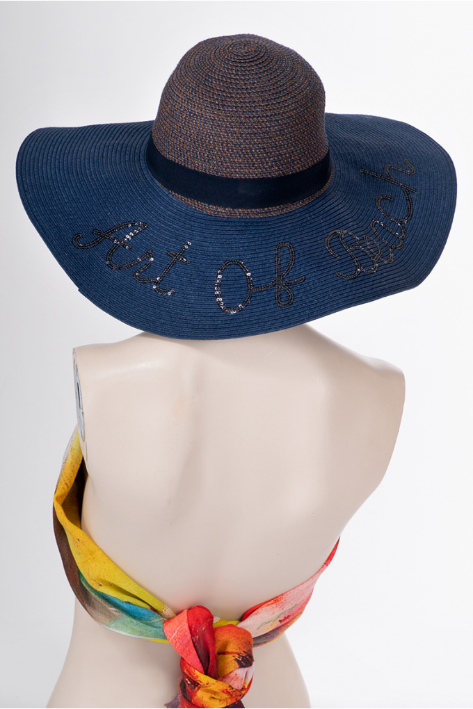 Дамска шапка в тъмносиньо с надпис от пайети