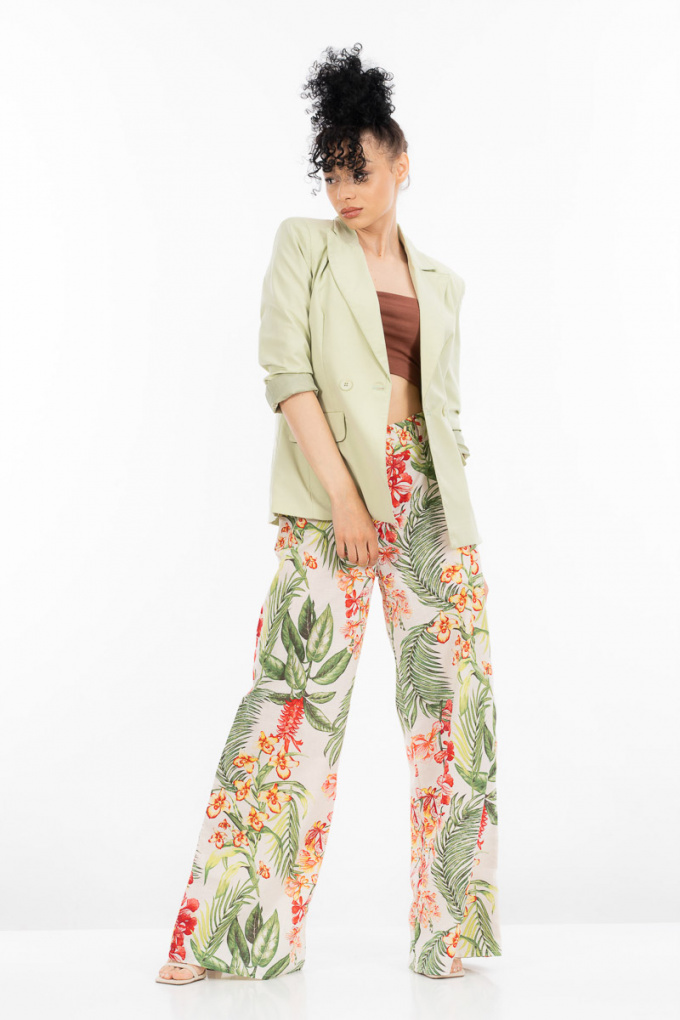 Дамски панталон от лен в цвят екрю с принт зелени листа