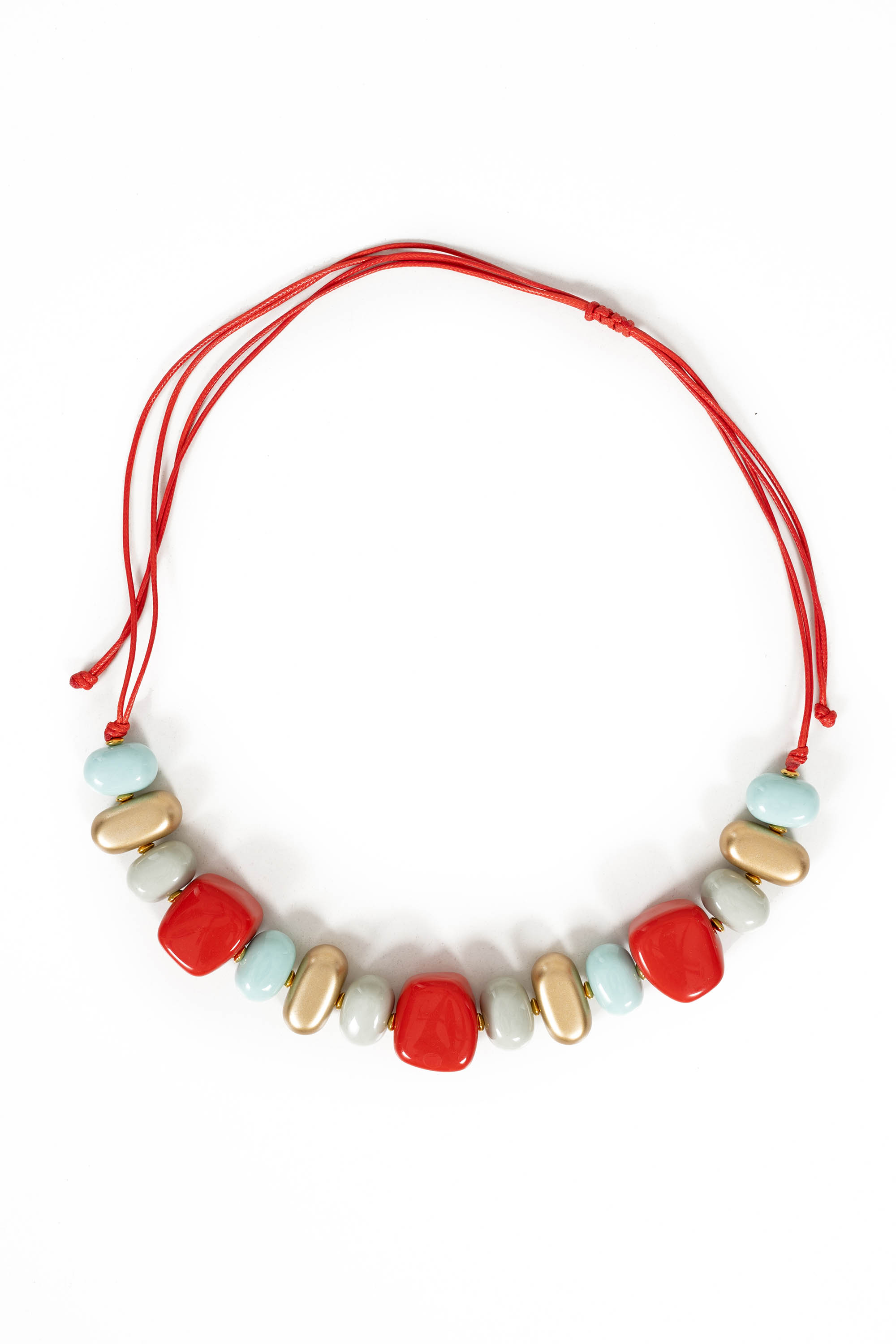 Дамско колие с едри камъни в червено, златно и синьо